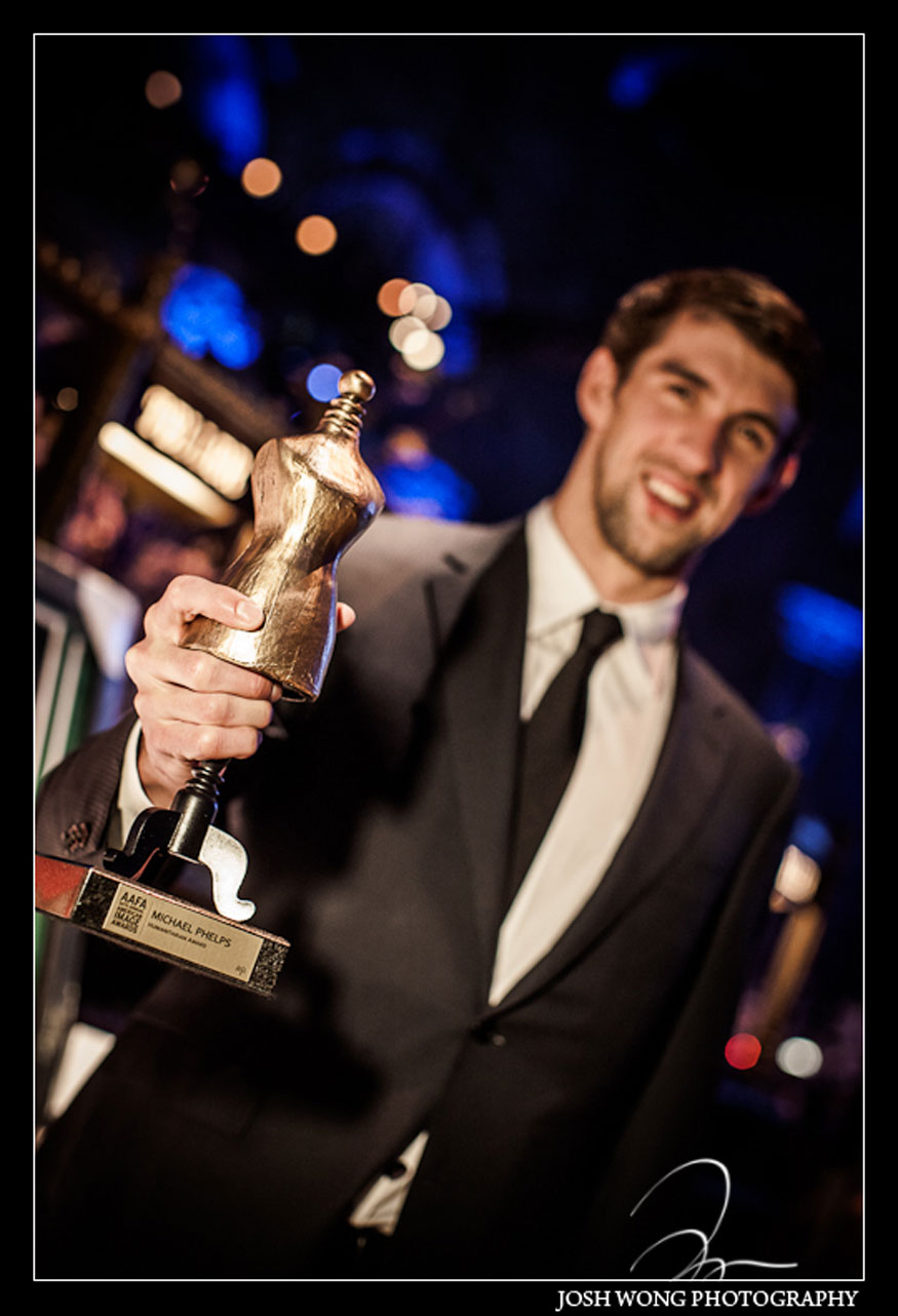 Michael Phelps shows his award by Josh Wong Photography