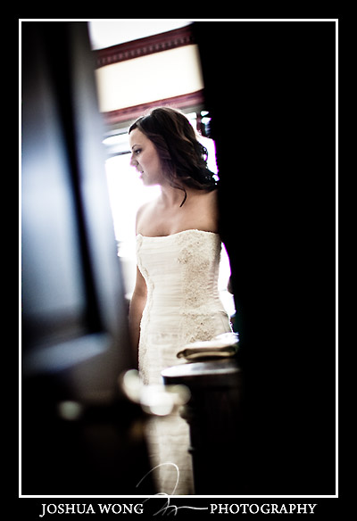 A voyeuristic view the bride getting ready before the first look. The Mansion at Oyster Bay wedding by top Long Island wedding photographers Josh Wong Photography