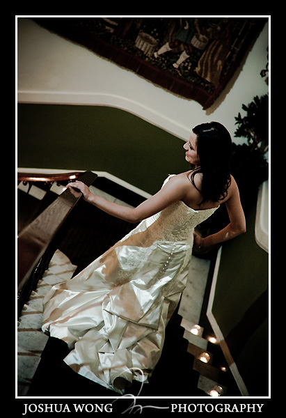 The bride walks down the lovely Mansion at Oyster Bay staircase. Wedding photos by Long Island Wedding Photographer Josh Wong