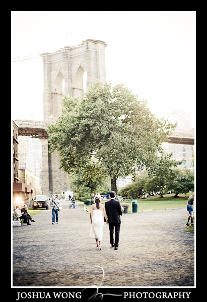 The bride and groom have their sunset ceremony on the beach in between Brooklyn Bridge and Manhattan Bridge. Brooklyn Wedding Photography