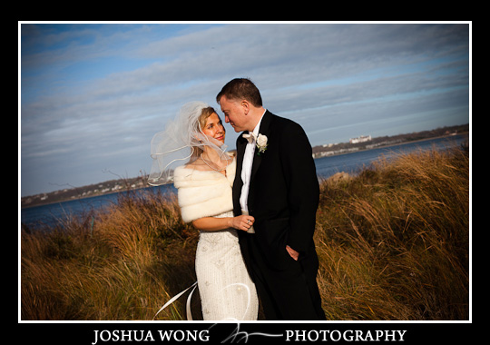 The wedding couple enjoys a moment together on the beach at Gurney's Resort and Spa | Hampton's Wedding Photography by Josh Wong 