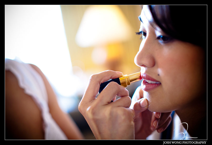 A bridesmaid getting ready at Fairmont Kea Lani Hotel in Maui Hawaii - Jenn & Stephen - Wedding Pictures by Destination Wedding Photographer Josh Wong Photography,