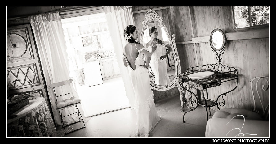 The bride getting ready in the bridal suite at Haiku Mill. Haiku Mill Destination Wedding, Maui Hawaii - Wedding Pictures by Destination Wedding Photographer Josh Wong Photography