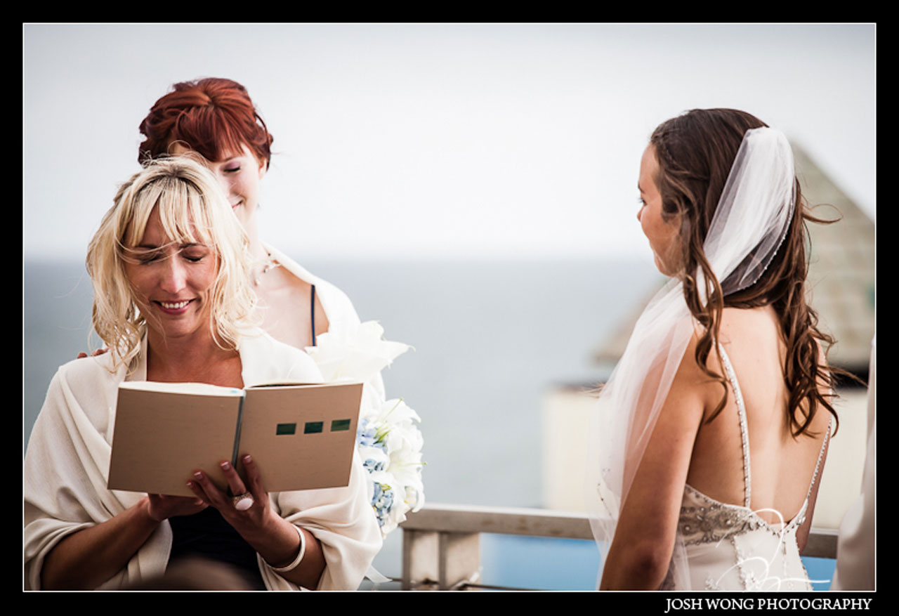 Best wedding candid moments at a wedding. A San Francisco Wedding at the Cliff House Restaurant by top Bay Area wedding photographer Josh Wong Photography