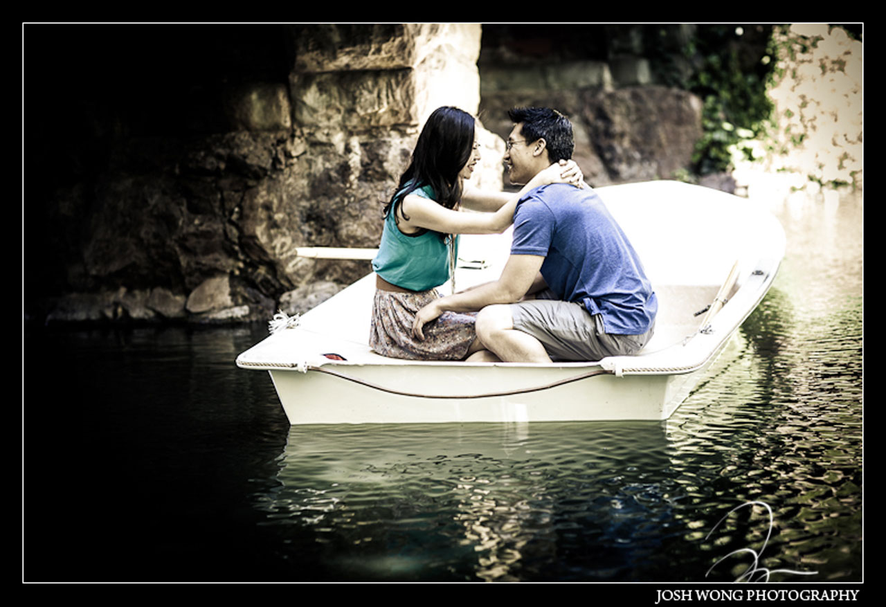 An engagement photo at Stow Lake in Golden Gate Park in San Francisco. Boats can be rented at the Boathouse. Engagement photo by top San Francisco Wedding Photographer Josh Wong Photography