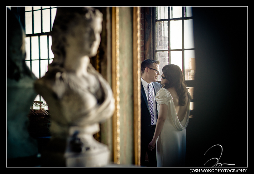 The bride and groom enjoy a private moment together while waiting for their guest to arrive before the wedding. Metropolitan Building, Long Island City