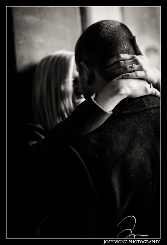 Engaged couple at the Bethesda Fountain. photo by top NYC wedding photographer Josh Wong.