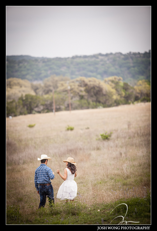 An open ranch field in San Antonio, TX.  Engagement Pictures - The Missions, The River Walk, The Alamo, Ranches,  Blue Bonnets, and BBQs Galore - engagement photos by Josh Wong Photography