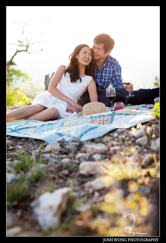 Enjoying a little picnic as the sun was setting in San Antonio, TX. Engagement Pictures - The Missions, The River Walk, The Alamo, Ranches, Blue Bonnets, and BBQs Galore - engagement photos by Josh Wong Photography
