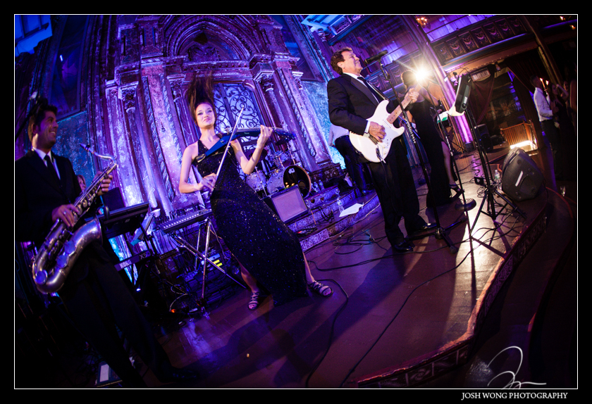 Electric Violinist rocking with the live wedding band. Angel Orensanz Wedding