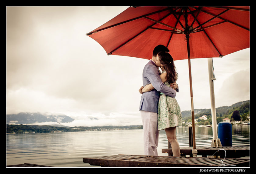 An engagement photo session at The Leonstain beach club docks in Pörtschach by top international destination engagement and wedding photographer Josh Wong Photography