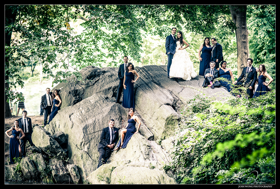 A Central Park wedding bridal party photograph take at the Lake near the Gapstow Bridge. Captured by Josh Wong Photography