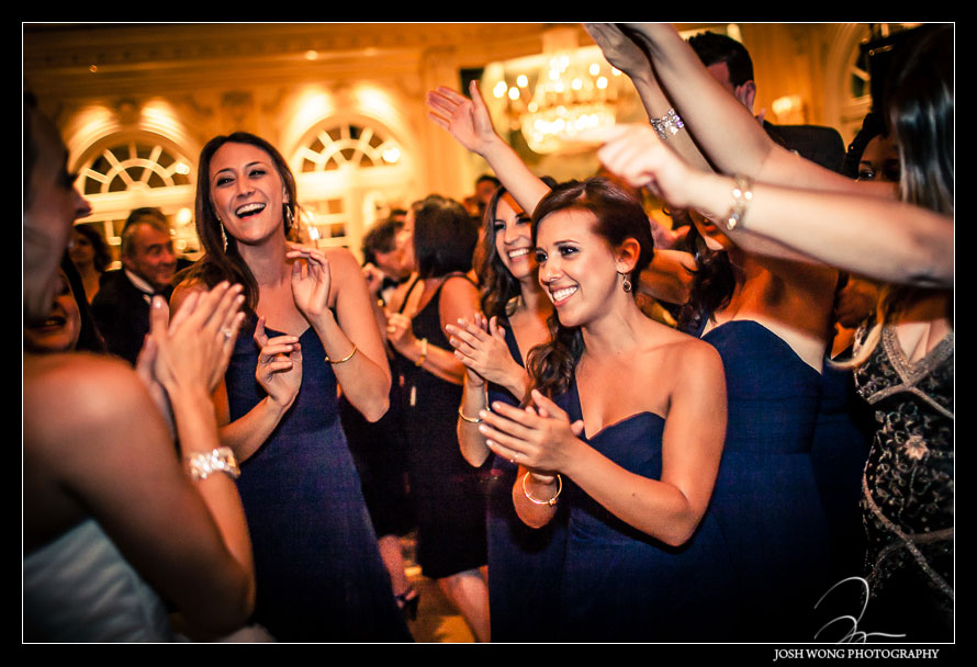 Friends and family having a blast at the wedding reception.