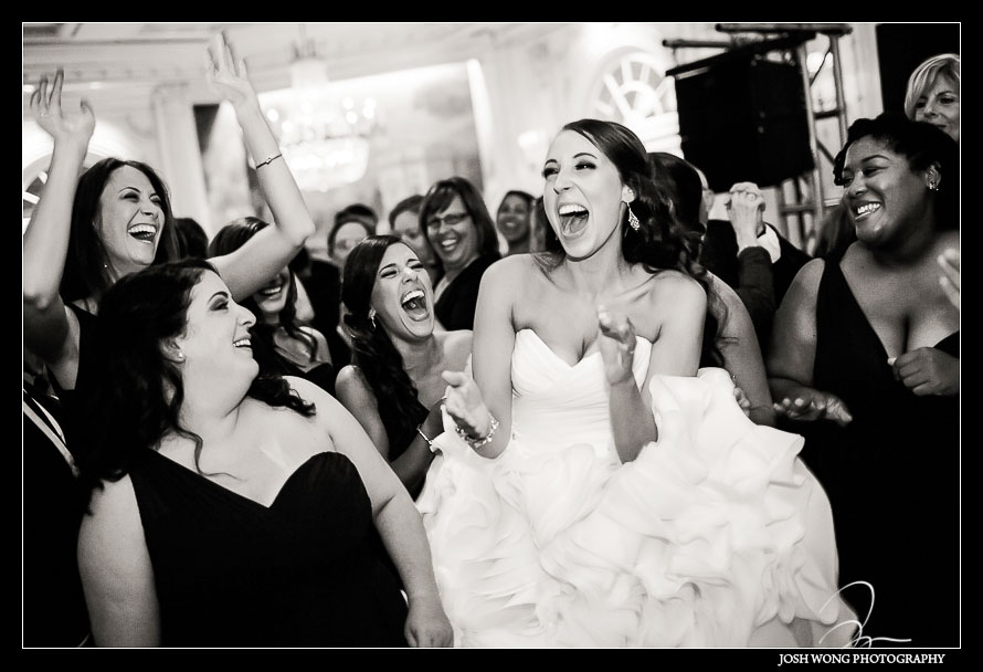 Friends and family having a blast at the wedding reception.
