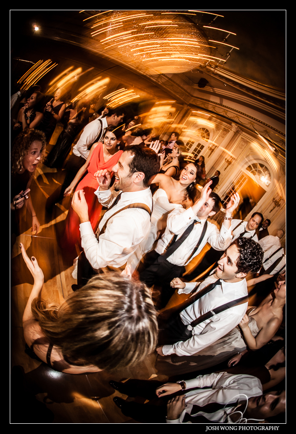 Friends and family having a blast at the wedding reception.