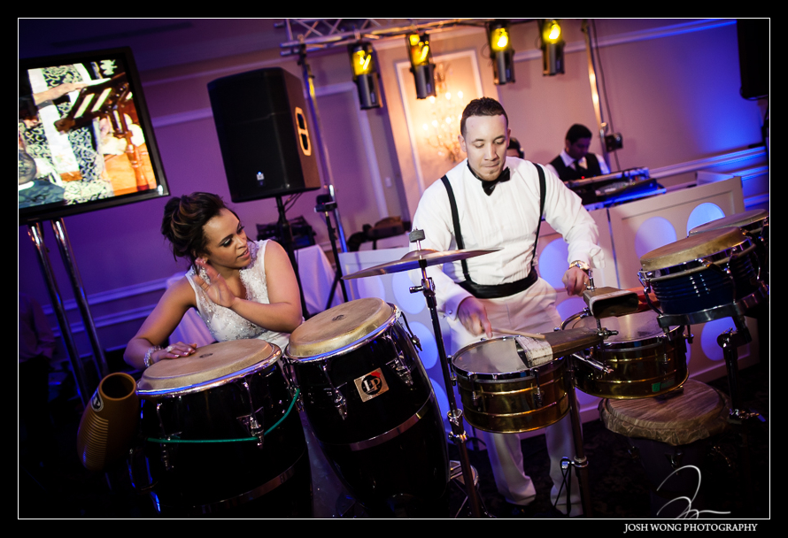 The wedding couple join the tonga band.
