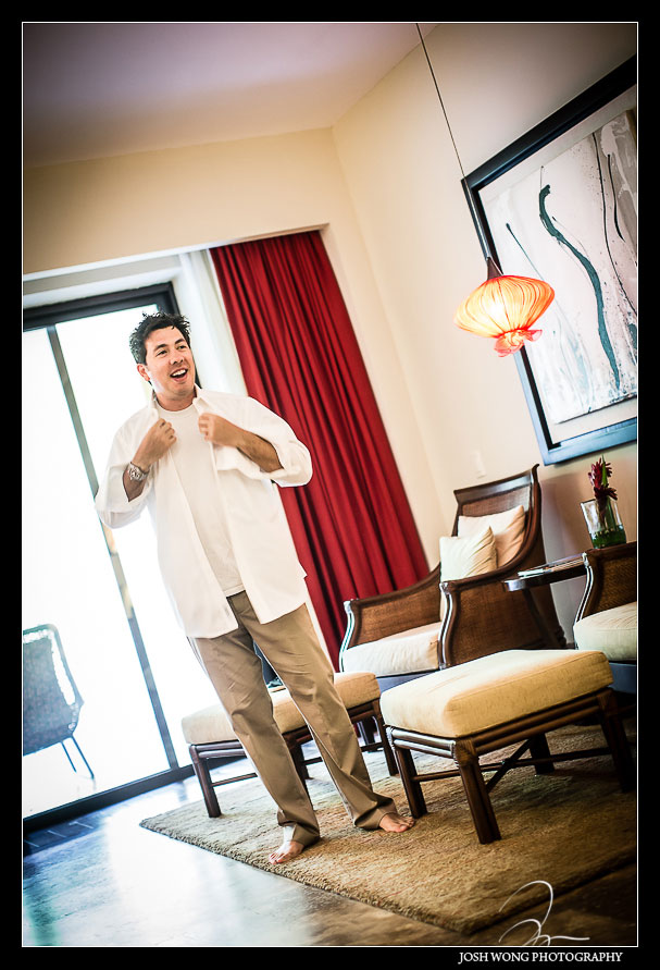 The groom getting ready. Destination Wedding at Grand Velas Resort in Playa Del Carmen, Mexico. Wedding Pictures and photos by top destination wedding photographer Josh Wong Photography