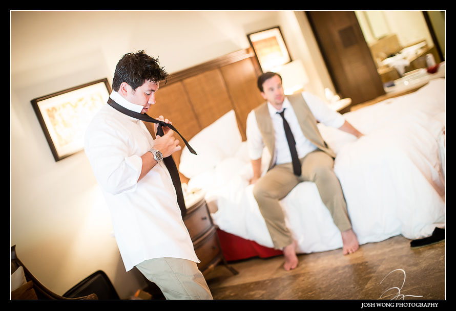 The groom getting ready. Destination Wedding at Grand Velas Resort in Playa Del Carmen, Mexico. Wedding Pictures and photos by top destination wedding photographer Josh Wong Photography