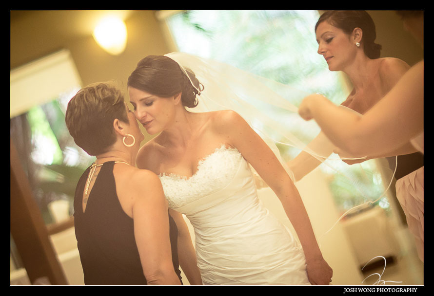 A touching moment with Mom and daughter. Destination Wedding at Grand Velas Resort in Playa Del Carmen, Mexico. Wedding Pictures and photos by top destination wedding photographer Josh Wong Photography