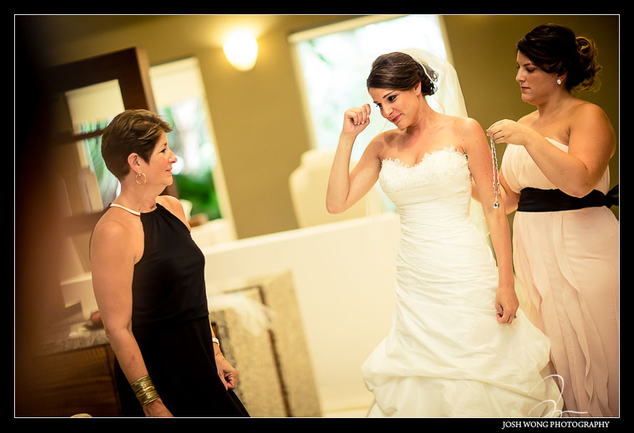 A touching moment with Mom and daughter. Destination Wedding at Grand Velas Resort in Playa Del Carmen, Mexico. Wedding Pictures and photos by top destination wedding photographer Josh Wong Photography