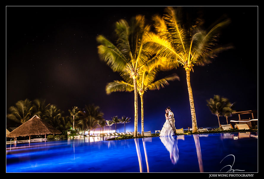 Final shot of the evening was at the infinity pool. Destination Wedding at Grand Velas Resort in Playa Del Carmen, Mexico. Wedding Pictures and photos by top destination wedding photographer Josh Wong Photography