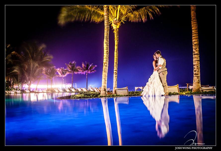 Final shot of the evening was at the infinity pool. Destination Wedding at Grand Velas Resort in Playa Del Carmen, Mexico. Wedding Pictures and photos by top destination wedding photographer Josh Wong Photography