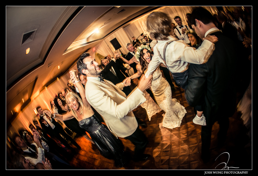 The couple enjoying their moments on the dance floor with their friends and family.