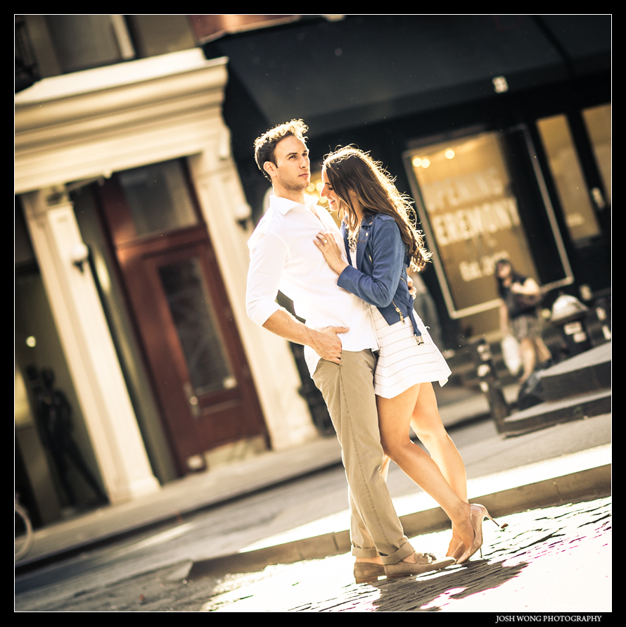 Crosby Street in SoHo with the sun cresting over from behind the building providing some amazing light. Soho Engagement pictures by NYC Photographer Josh Wong