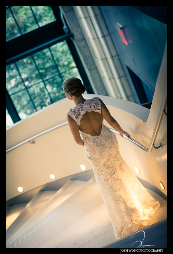 The bride walks down the spiral staircase. Guastavino's New York City Wedding Photos by Josh Wong Photography
