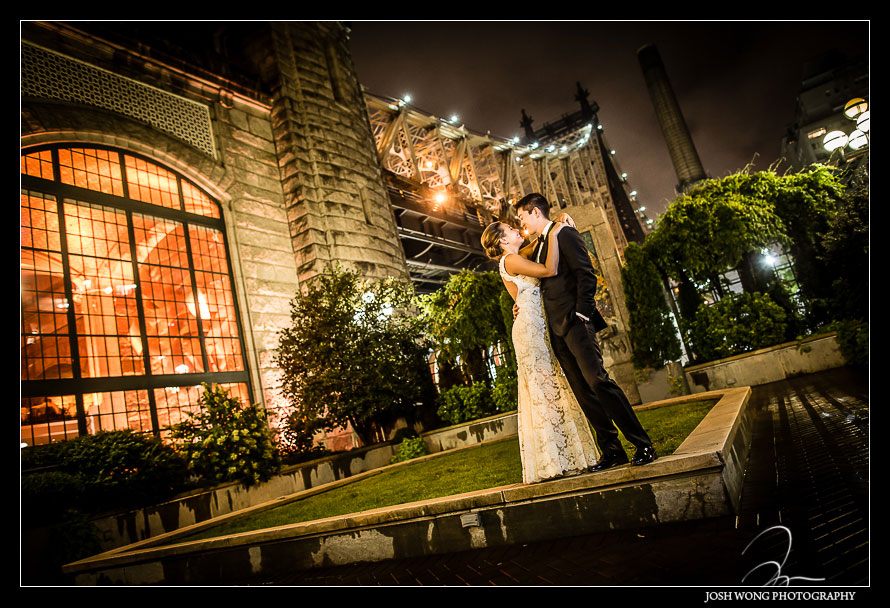 The magnificent nighttime wedding picture outside of Guastavino's with the bridge in the background. Wedding pictures by one of NYC's Top Wedding Photographers - Josh Wong Photography