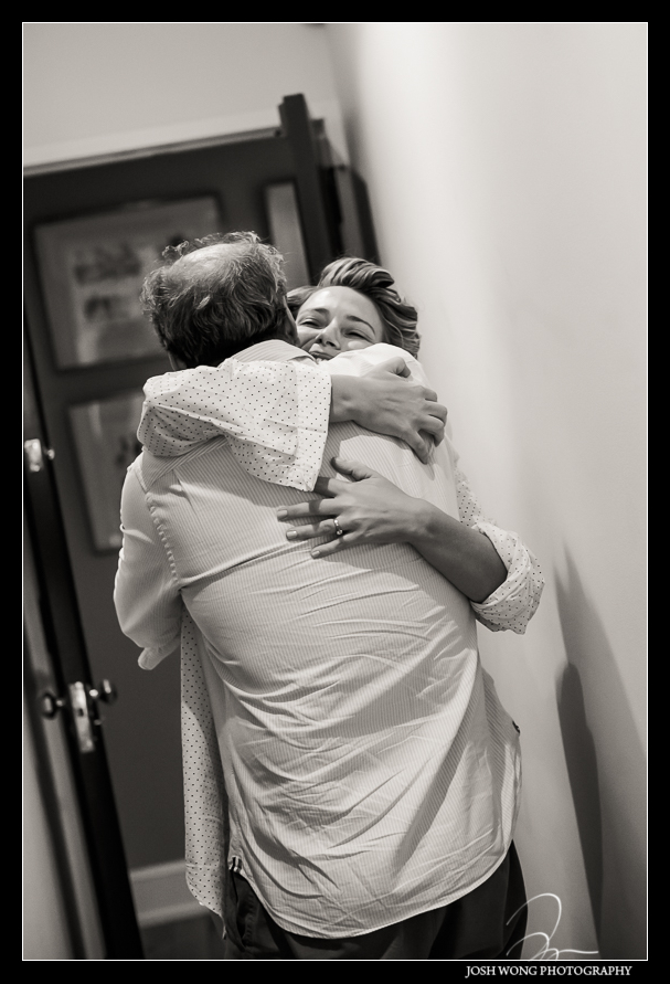 The bride and groom getting ready for their New York City wedding. A moment with the father of the bride.