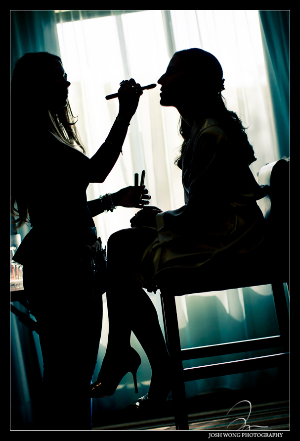 Silhouette wedding photo of the bride getting ready. Glen Island Harbor Club Wedding New York. Pictures by NYC Wedding Photographer Josh Wong Photography