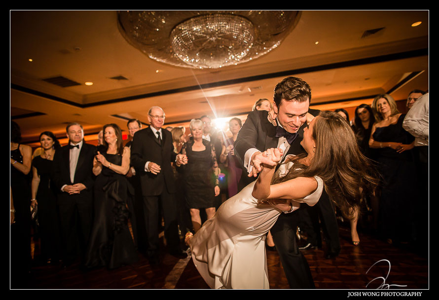 The groom dipped the bride during their first dance. photo by Josh Wong Photography