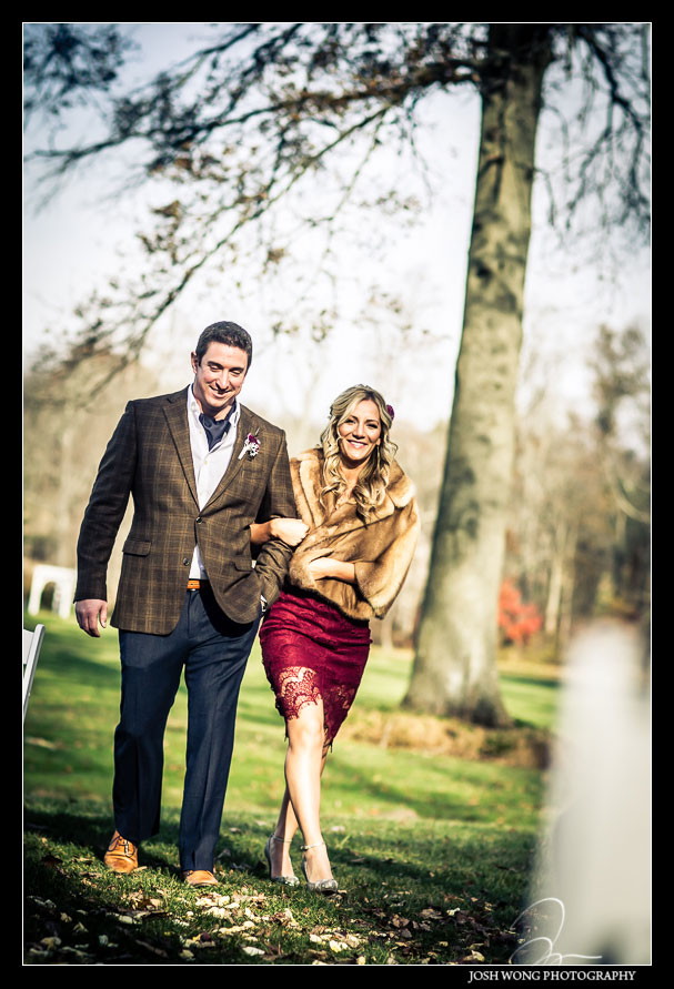 A bridesmaid and groomsman make their entrance for the ceremony ahead of the bride. Brandywine Manor House