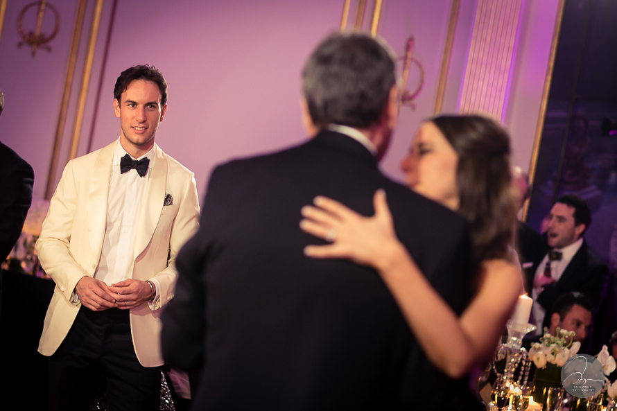 Best wedding moments when the groom is watch the father-daughter dance.  A Lotte New York Palace Hotel Wedding by top NYC wedding photographers Josh Wong Photography