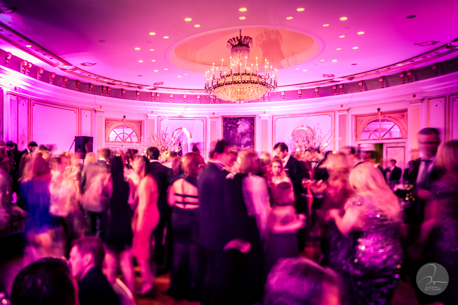 Guest dancing the night away to the music from the live band.  A Lotte New York Palace Hotel Wedding by top NYC wedding photographers Josh Wong Photography