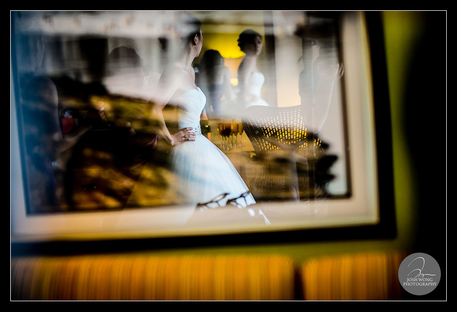 The bride gets ready at a nearby hotel before heading to Bourne Mansion. Top wedding photos by Josh Wong Photography