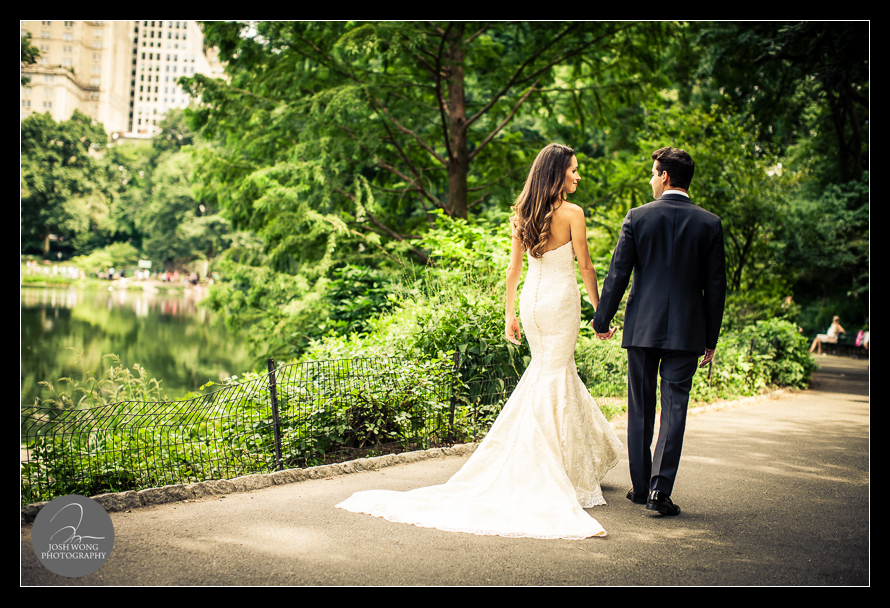 The bride and the groom take a stroll through central park.  Wedding Pictures and photos provided by Josh Wong Photography, New York City