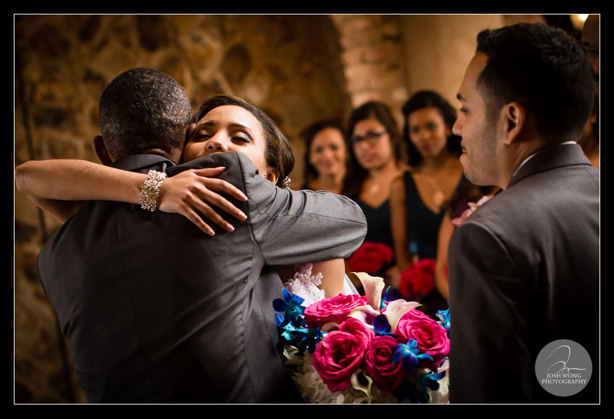 Father daughter embrace at the wedding ceremony. Wedding pictures provided by Josh Wong Photography