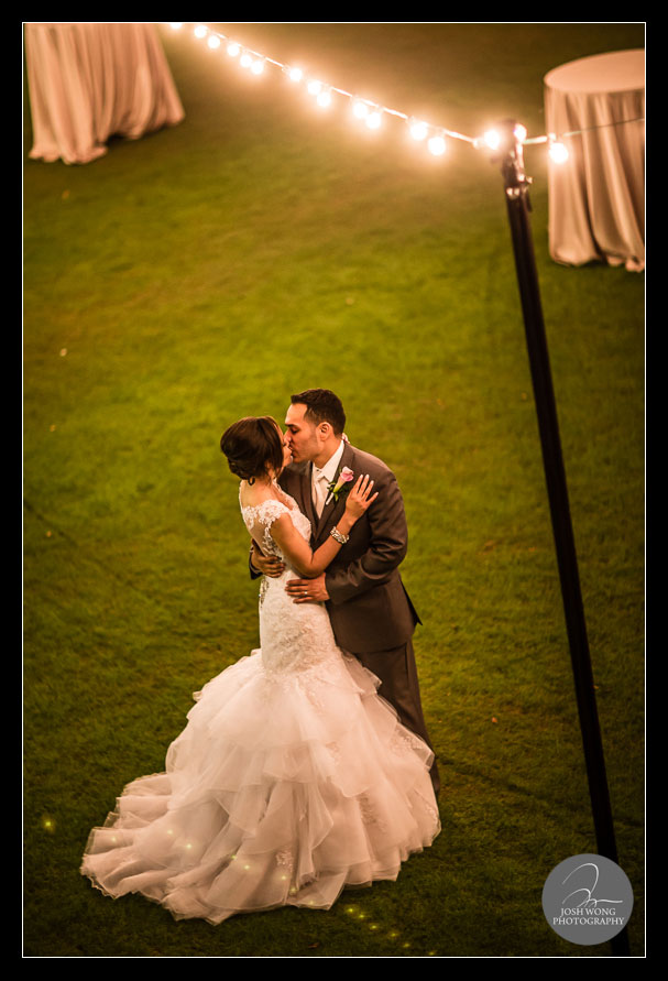 An intimate moment on the Bella Collina Grand Lawn.  Wedding photos provided by top wedding photographer Josh Wong Photography