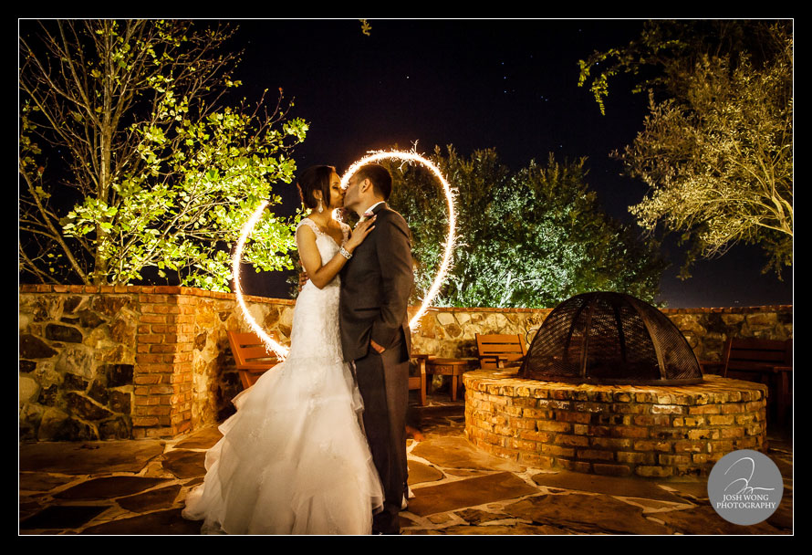 The Wedding Final Shot. The couple enjoy a moment together. Photo taken by Josh Wong Photography