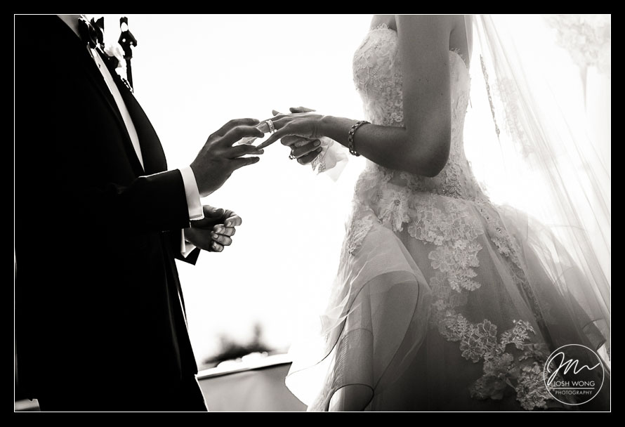 The ring exchange sealing their vows. A sunset filled wedding ceremony at Tappan Hill Mansion, Tarrytown NY. Wedding pictures by Top New York Wedding Photographer Josh Wong Photography