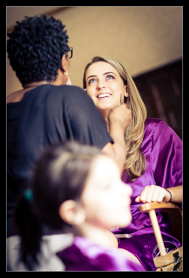 a beautiful bridesmaid wearing custom purple robes. Waldorf Astoria wedding photos by Josh Wong Photography