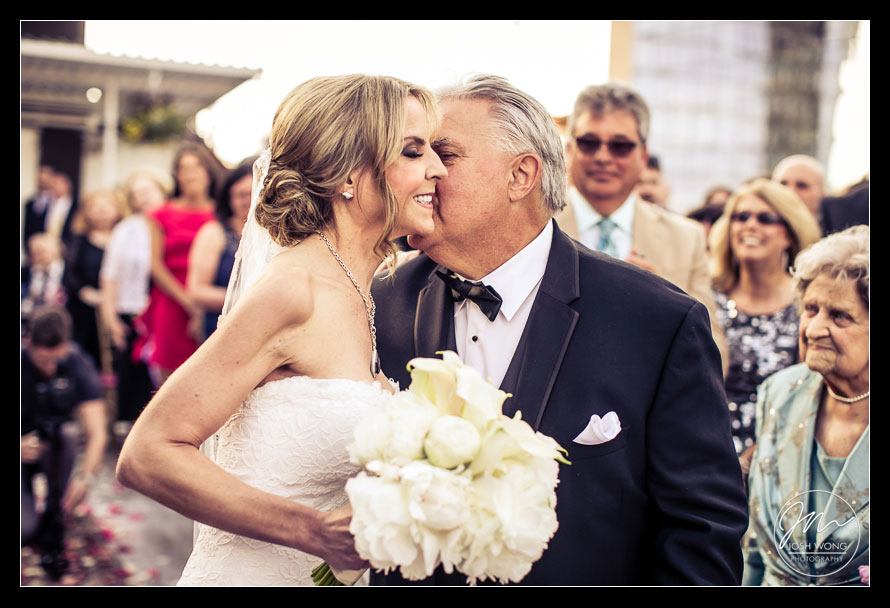 Best wedding moments with the Father of the Bride giving away his daughter. Candid wedding moments by Josh Wong Photography