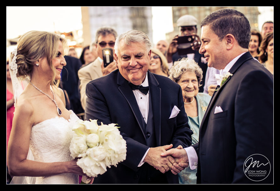 Best wedding moments with the Father of the Bride giving away his daughter. Candid wedding moments by Josh Wong Photography