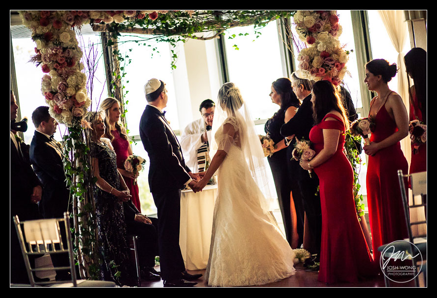 A sunset ceremony at The View at The Battery. Wedding photography by Josh Wong Photo
