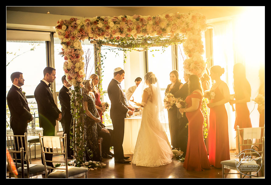 A sunset ceremony at The View at The Battery. Wedding photography by Josh Wong Photo