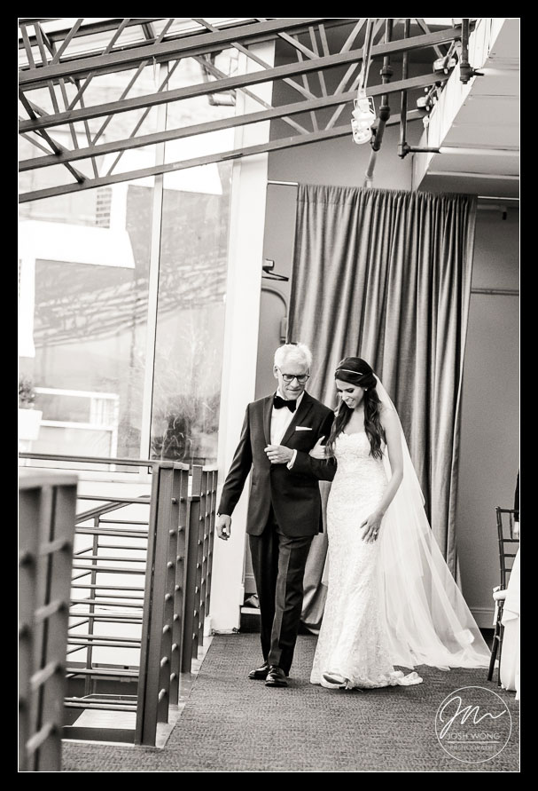 Father have a moment as he escorts his daughter down the aisle during. Tribeca Rooftop Wedding