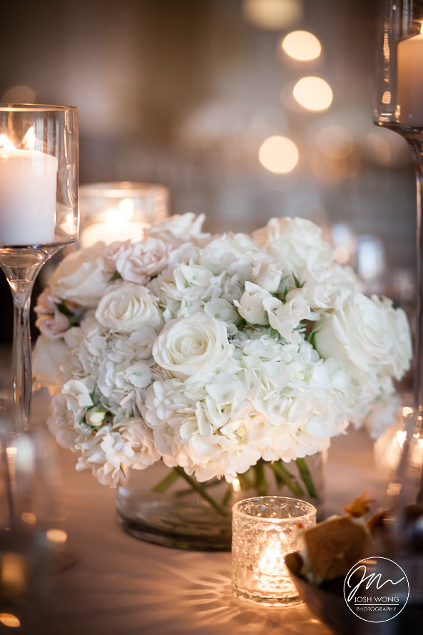Beautiful floral table centerpieces provided by Enza Events. 