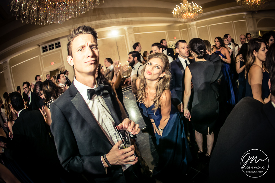 Some wedding guests pose for the wedding photographer Josh Wong.